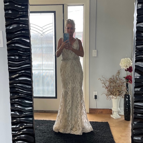 Mon Cheri intricate lace and beaded gown in champagne. - Picture 5 of 7